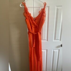 Flowing orange jumpsuit